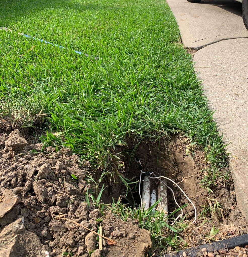 Exposed Irrigation Pipes from a GreenGate Technician doing a sprinkler repair in Atascocita